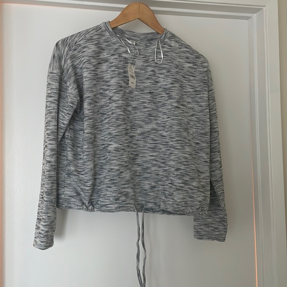 Long sleeve crew neck heather grey top with drawstring hem size small